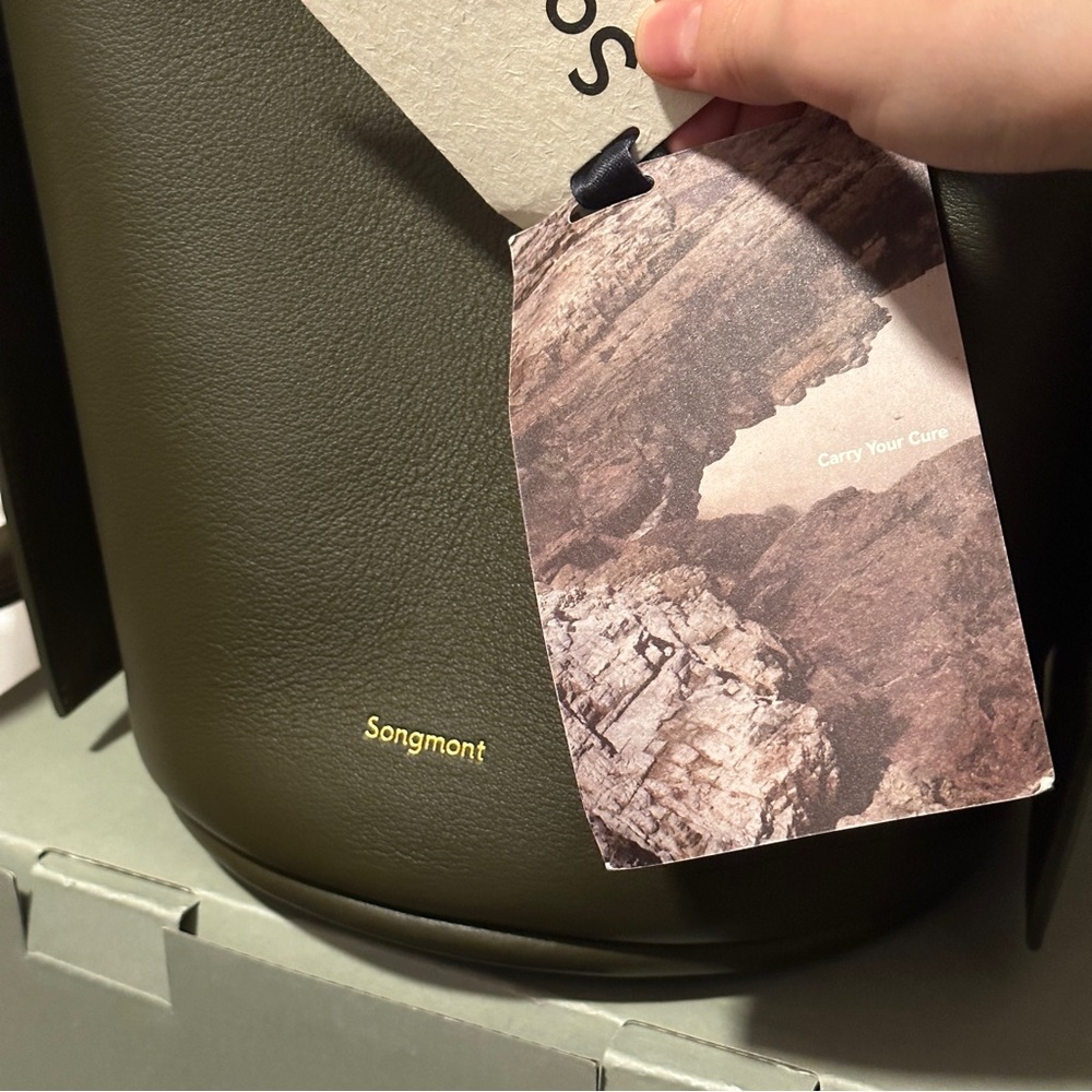 Completely new Songmont busket bag.